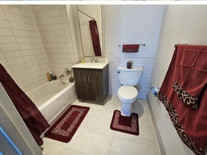 After: clean bathroom with fresh towels and mats