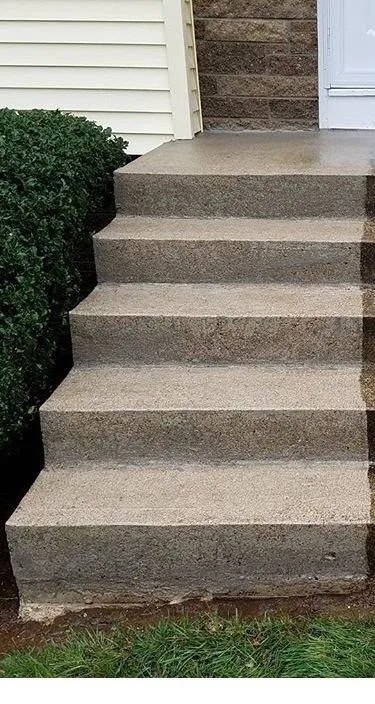After: pressure-washed front steps